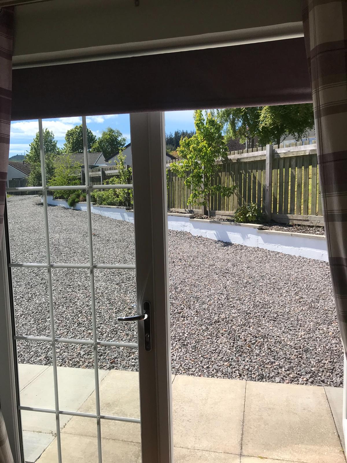 Lindfields view through french doors to private garden