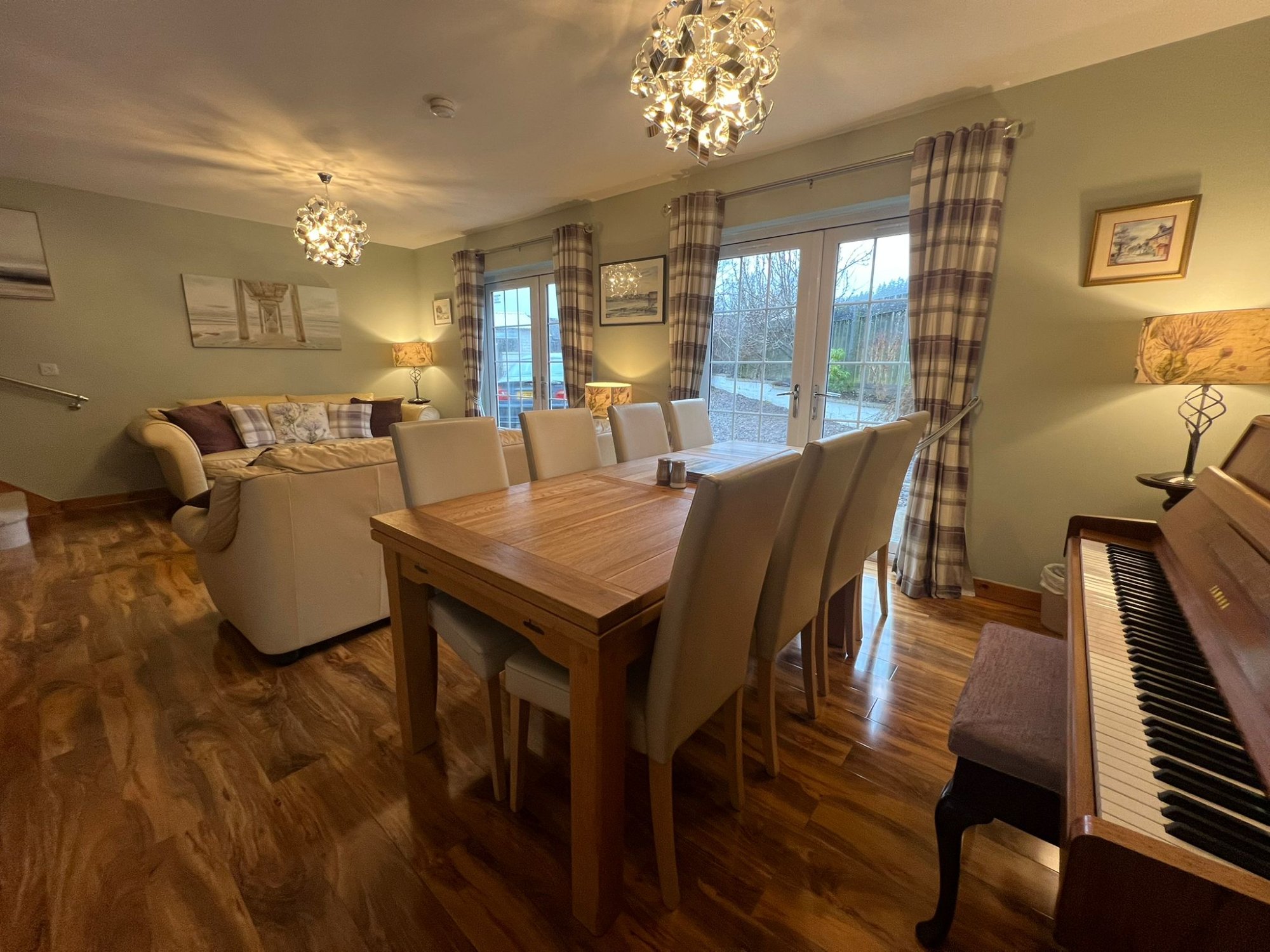 Lindfields open-plan living and dining room with piano, Inverness